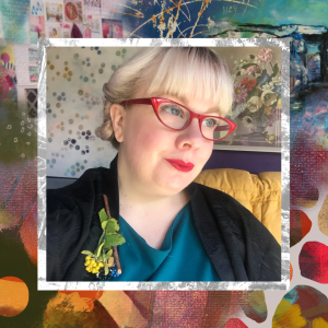 A portrait of a white woman with blonde hair, red glasses and colourful vintage clothes. She smiles and looks away into the distance.