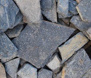 Grey split and broken caithness rocks at Spittal Quarry.