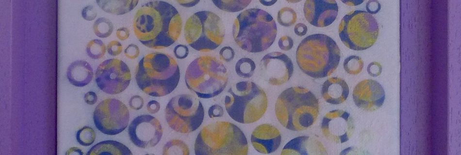 A square canvas with randomly arranged, closely tessellating small scale dots and rings in soft yellow and shades of purple on a pale lilac ground. Set in a wood tray frame painted mid purple.