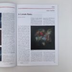 Open page of a art magazine showing square digital abstract artwork in dark tones alongside text, titled 'A Certain Ratio'.